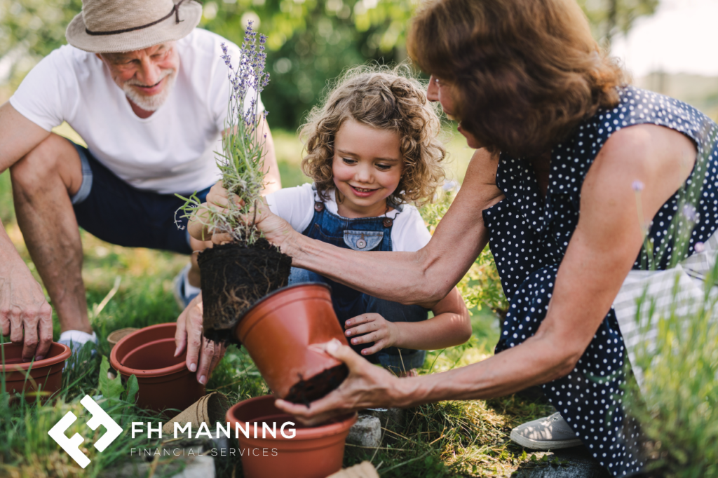 Little girl gardening with her granparents