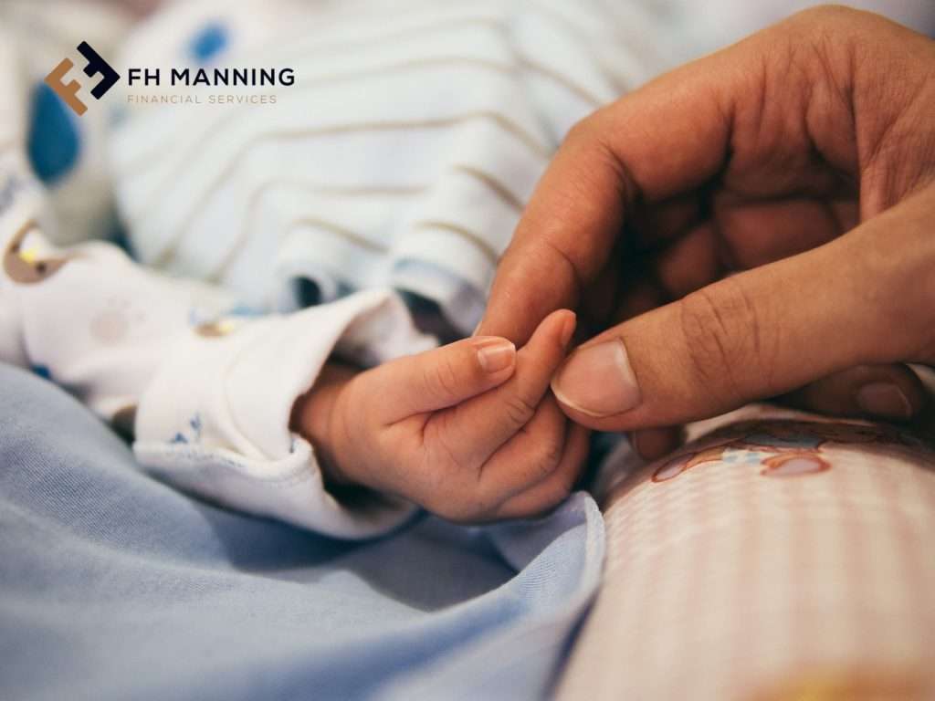 FH Manning Financial Services just one Financial thing blog image. Picture of adult holding baby's hand.