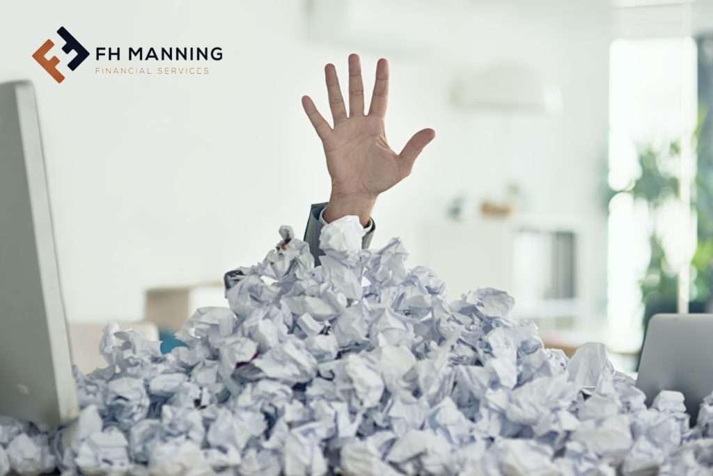 Hand reaching out from scrumpled paper