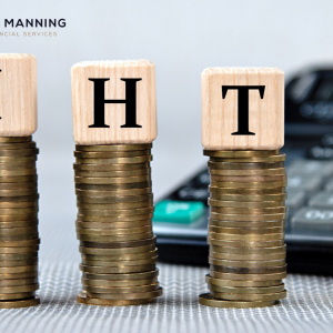 IHT letter blocks on 3 stacks of coins